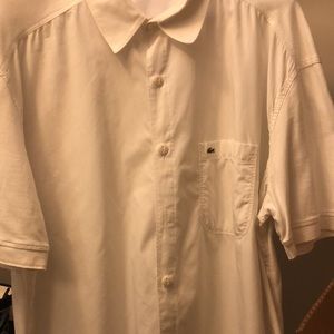 White Short sleeve Lacoste button down w/ a little stretch in arm for comfort
